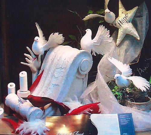 Window display with birds
