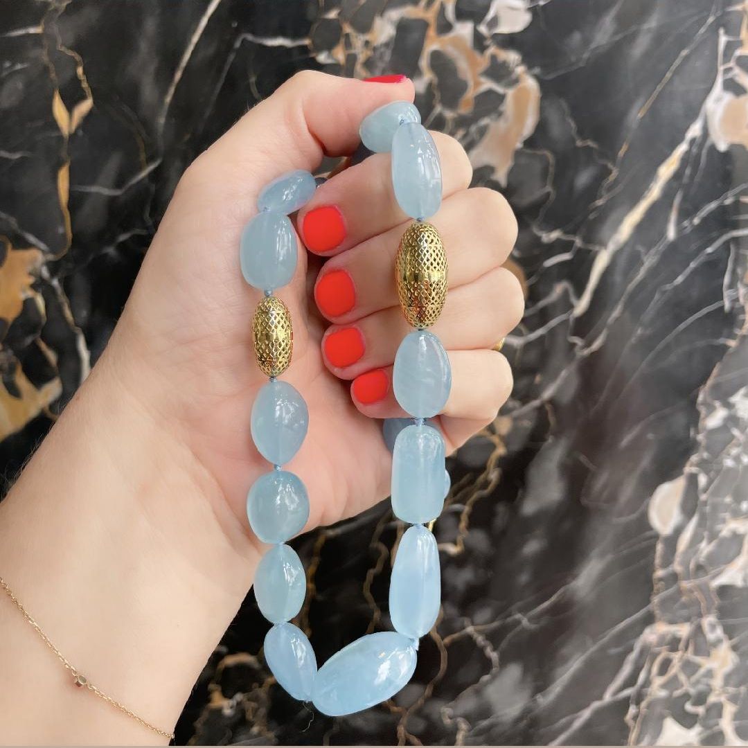 Ray Griffiths Crownwork Beads and Aquamarine Necklace. Beaded necklace featuring graduated aquamarine nuggets and two 18K yellow gold crownwork olive beads. Necklace measures 20.25" in length.