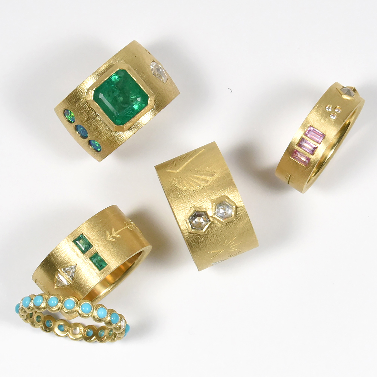Yellow gold and emerald rings and turquoise ring