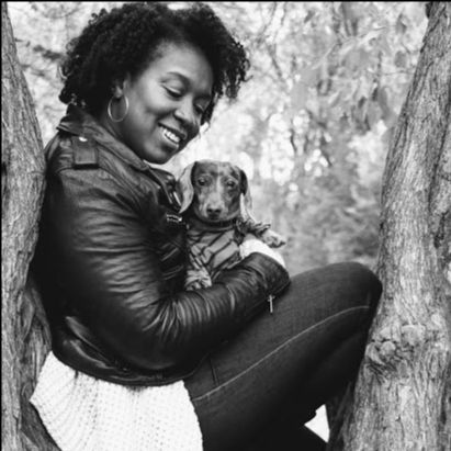Lauren Newton, jewelry designer and zoologist, with dog