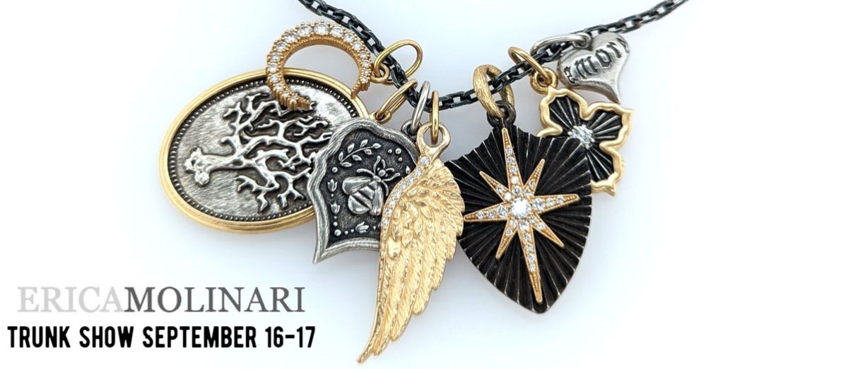 4 charms on a silver chain with the words Erica molinari in the lower left corner