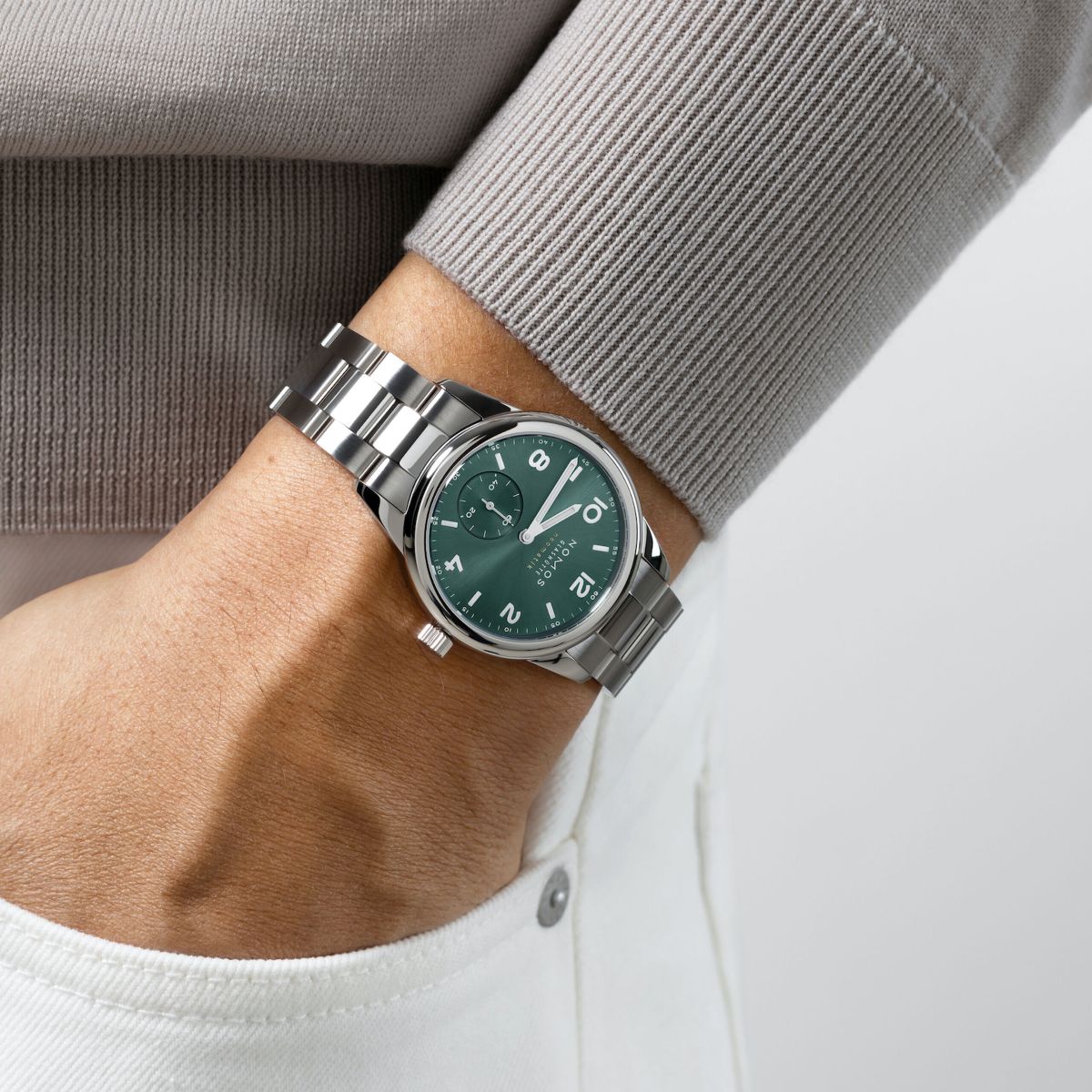 Nomos Club Sport Neomatik Petrol Stainless Steel Ref. 746. Stainless steel Club Sport bracelet with quick-change spring bars. Petrol green, with PVD coating and sunburst polishing, hour numerals and indexes with white superluminova