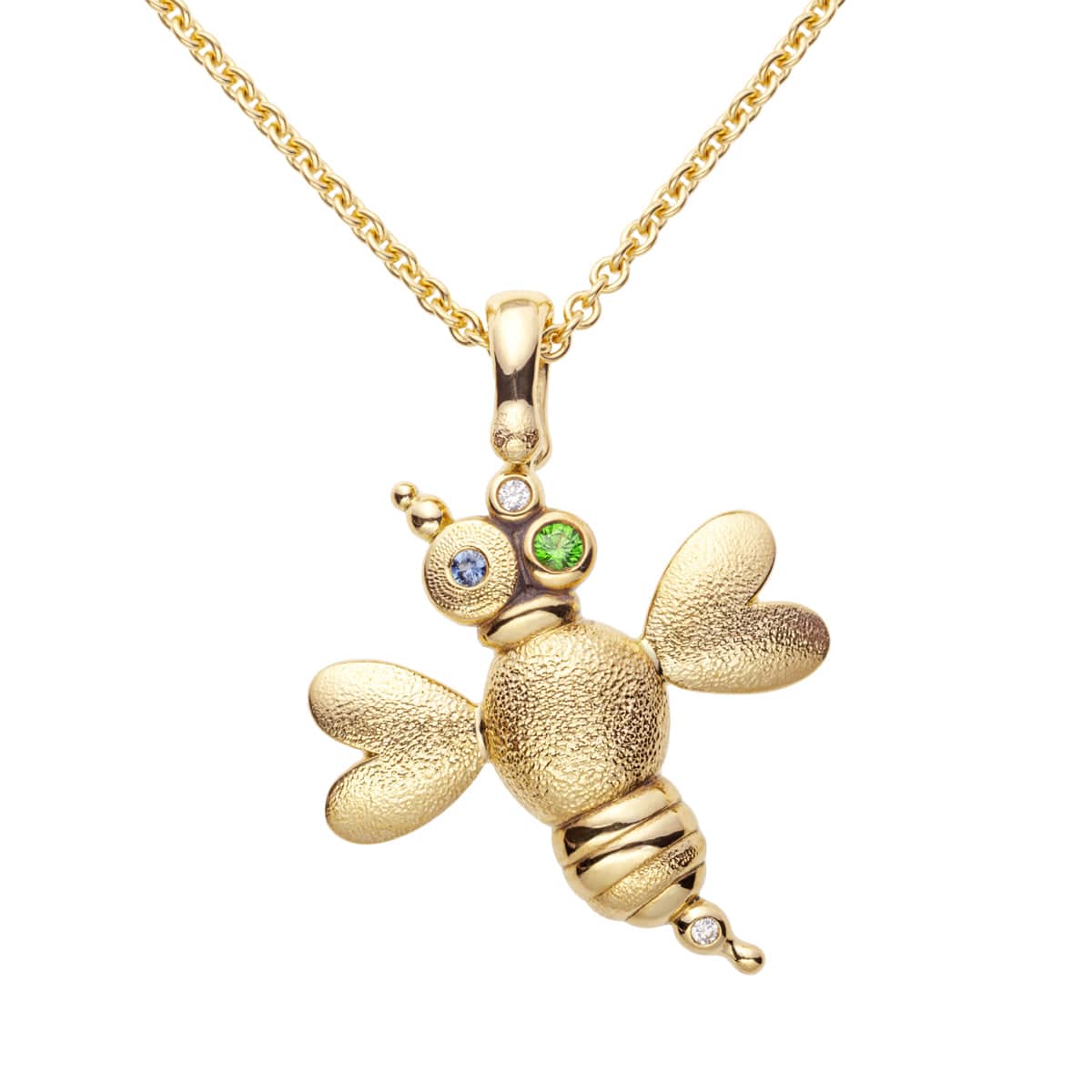 18ky gold artistic bug charm on a gold chain with a white background