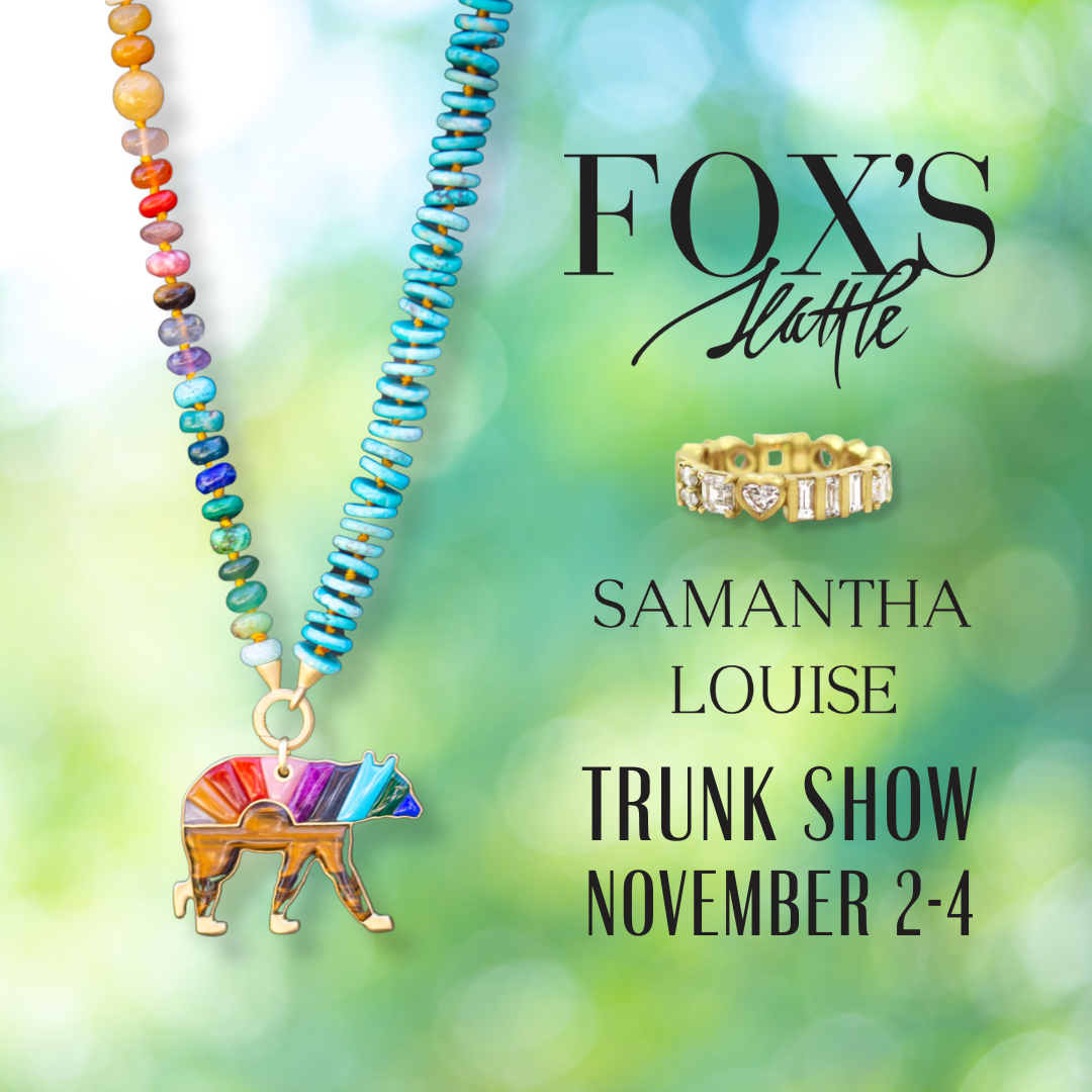 Green and white background with rainbow gemstone chain and rainbow bear pendant with the words "Fox's Seattle Samantha Louise Trunk Show November 2-4"