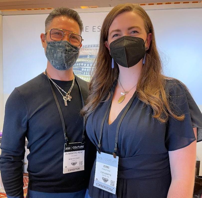 Photo of a man and a woman with masks on