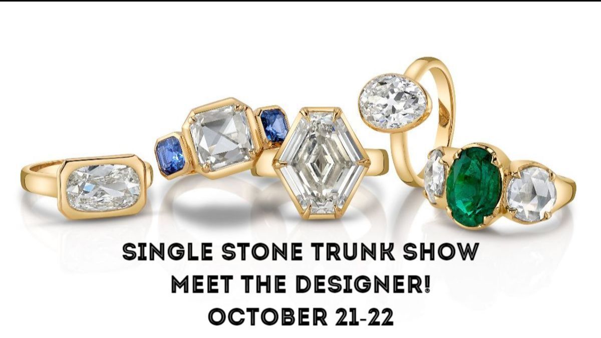 5 gold diamond and blue sapphire rings with the words "Single Stone Trunk Show/ Meet the designer/ October 21 & 22"