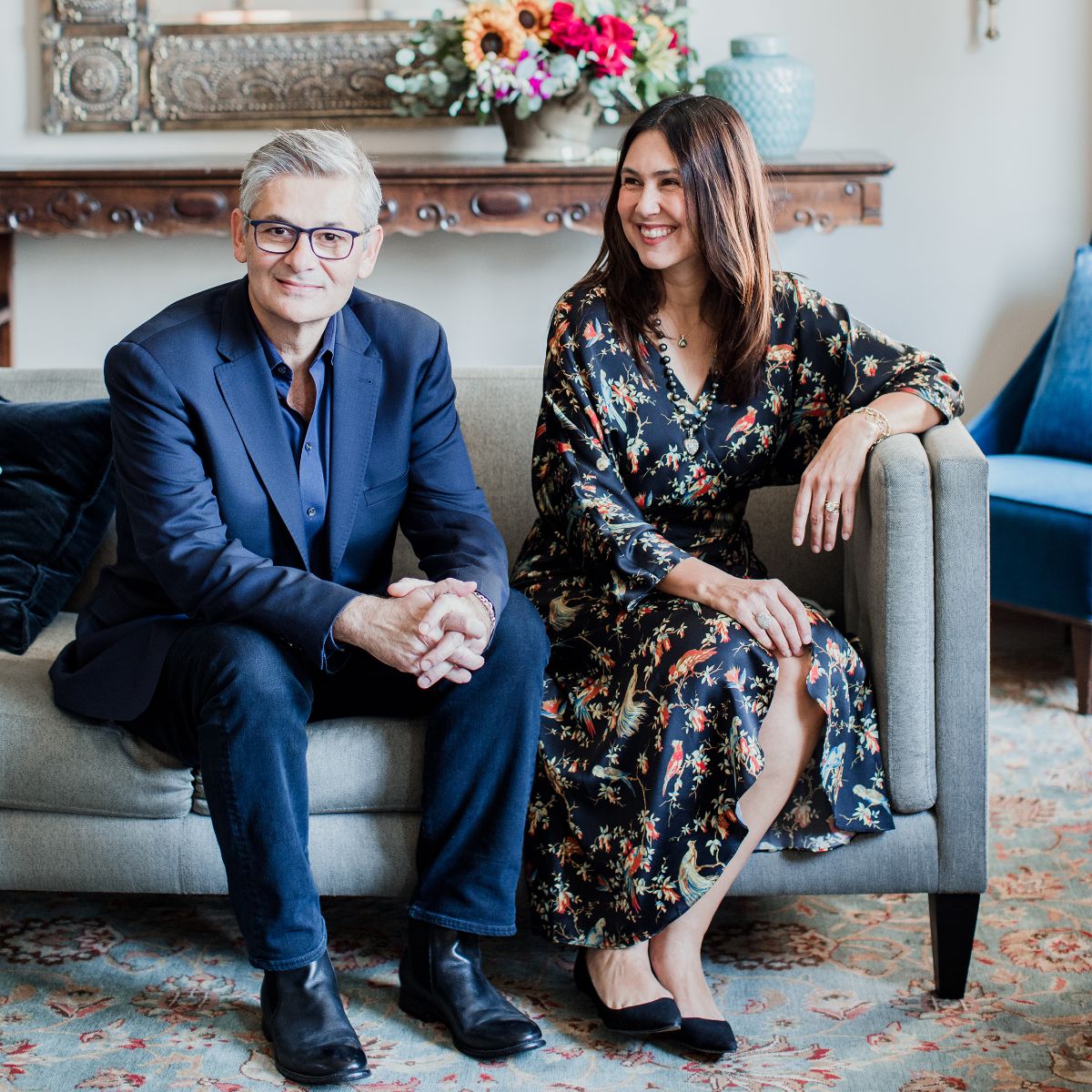 Photo of Ari and Corina from Single Stone sitting on a couch.