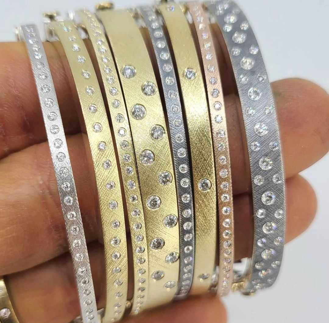 yellow and white gold bangles with diamonds