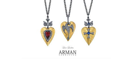 Arman heart shape pendants in silver and gold