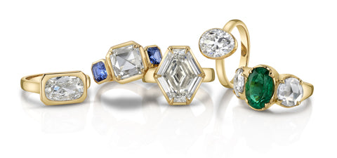 Five yellow gold engagement rings with diamonds and colored stones
