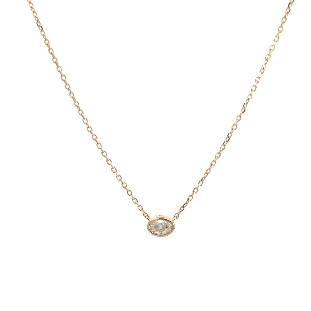 front side of 14k yellow gold bezel set diamond pendant