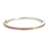 Rene Escobar 18k rose gold "maru" diamond bangle bracelet with diamonds on front in groups of 3 and a silver backside