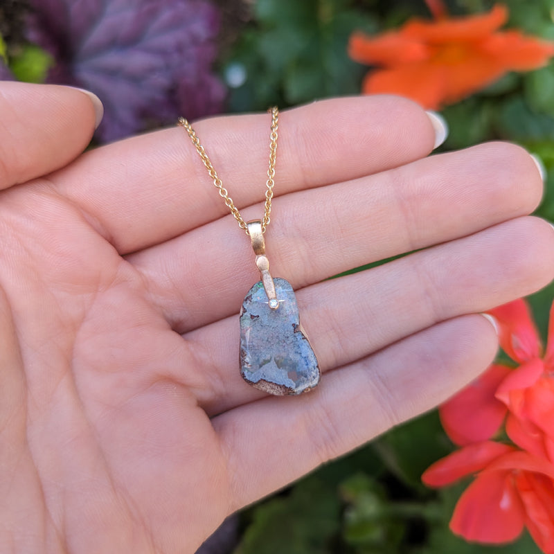 Alex Sepkus "Sticks and Stones" Mexican Matrix Opal Pendant in hand
