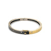 side angle of Rene Escobar 18k yellow gold "carol" diamond bangle bracelet