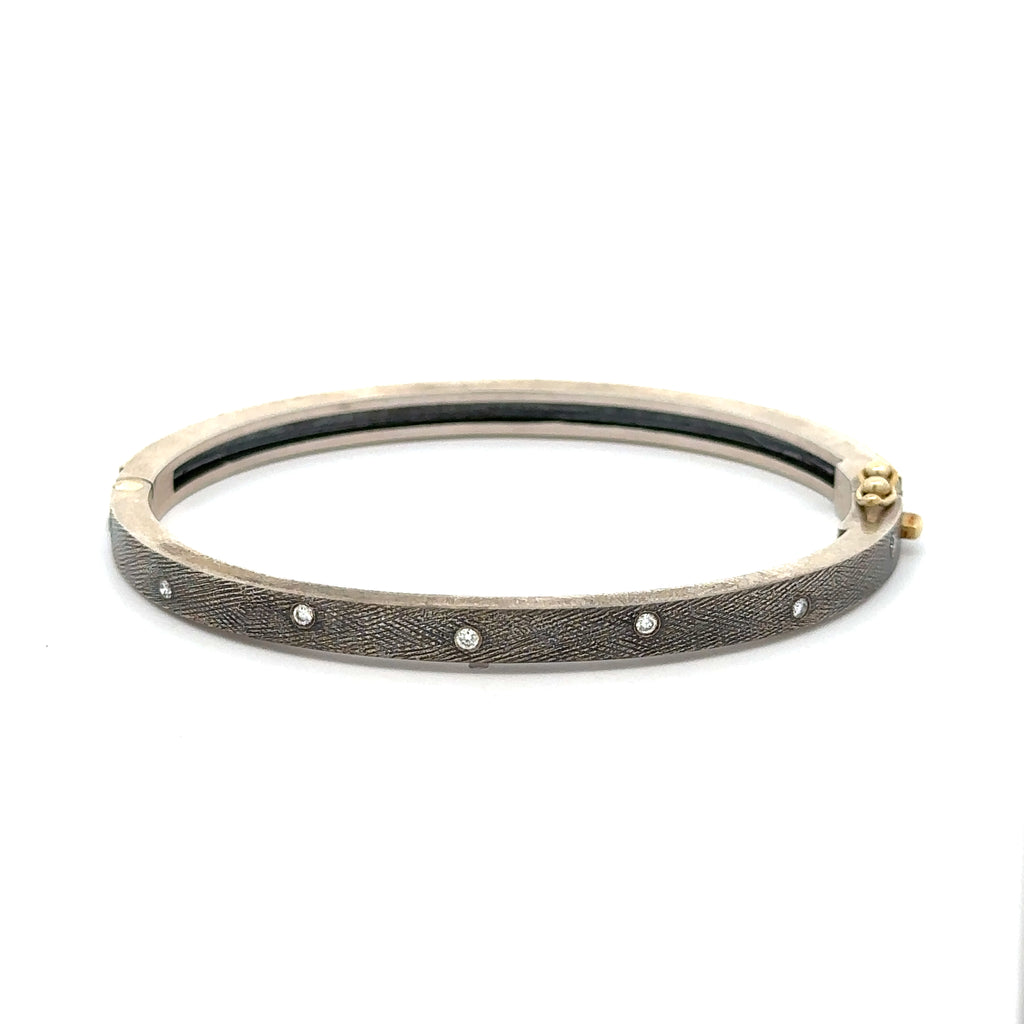 back side of Rene Escobar 18k yellow gold "carol" diamond bangle bracelet