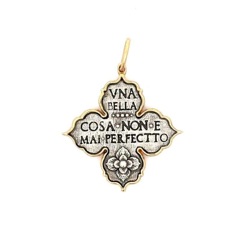 Erica Molinari C216D Sterling Silver and 18K gold rimmed 4 point ornate charm inscribed in Italian with "A beautiful thing is never perfect" on the backside with a layered flower below the text.