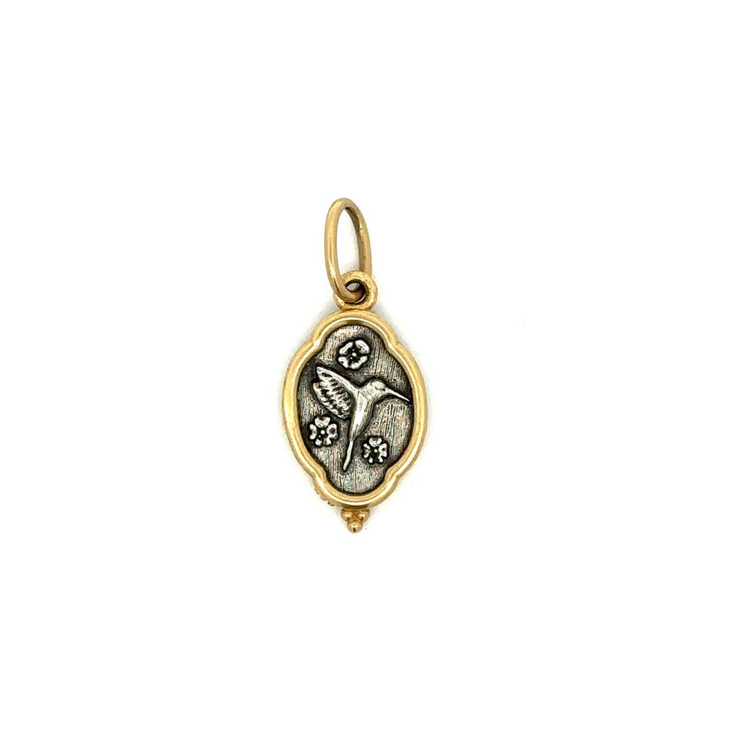 Erica Molinari sterling silver with 18k yellow gold rim small ornate charm with a hummingbird on the front side