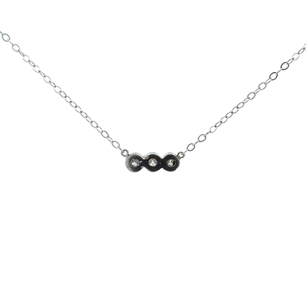 back side of 14k white gold bezel diamond pendant necklace