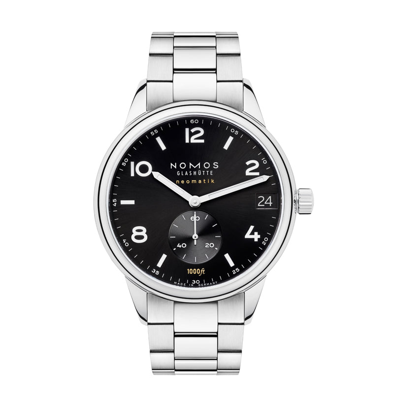 Stainless Steel watch with black face and roman numerals as well as dashes on a bracelet