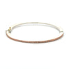 Rene Escobar 18K rose gold "laura" bangle bracelet with diamonds across the front