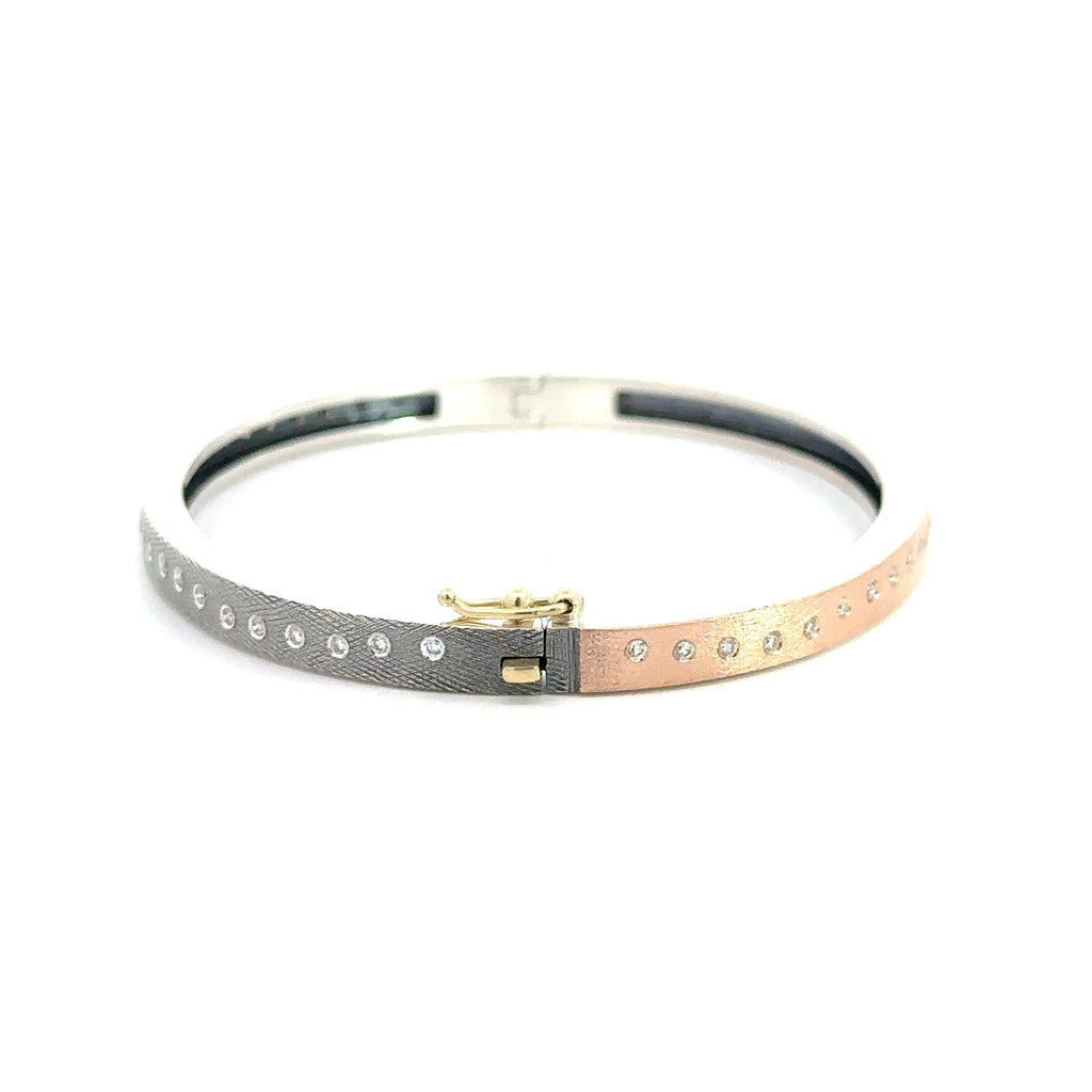 side angle of Rene Escobar 18k rose gold rene diamond bangle bracelet
