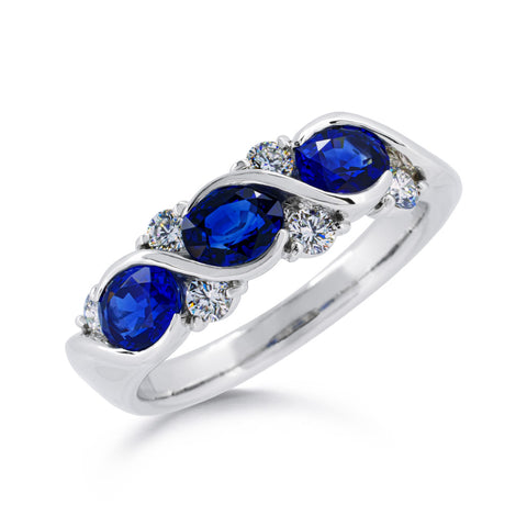 Suwa platinum anniversary style band with three oval sapphires and six round brilliant diamonds