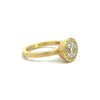 Todd Reed 18k yellow gold and diamond halo ring, side angle of ring.