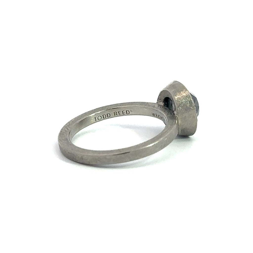 Back side of Todd Reed palladium diamond halo ring showing the "Todd Reed" stamp inside the band