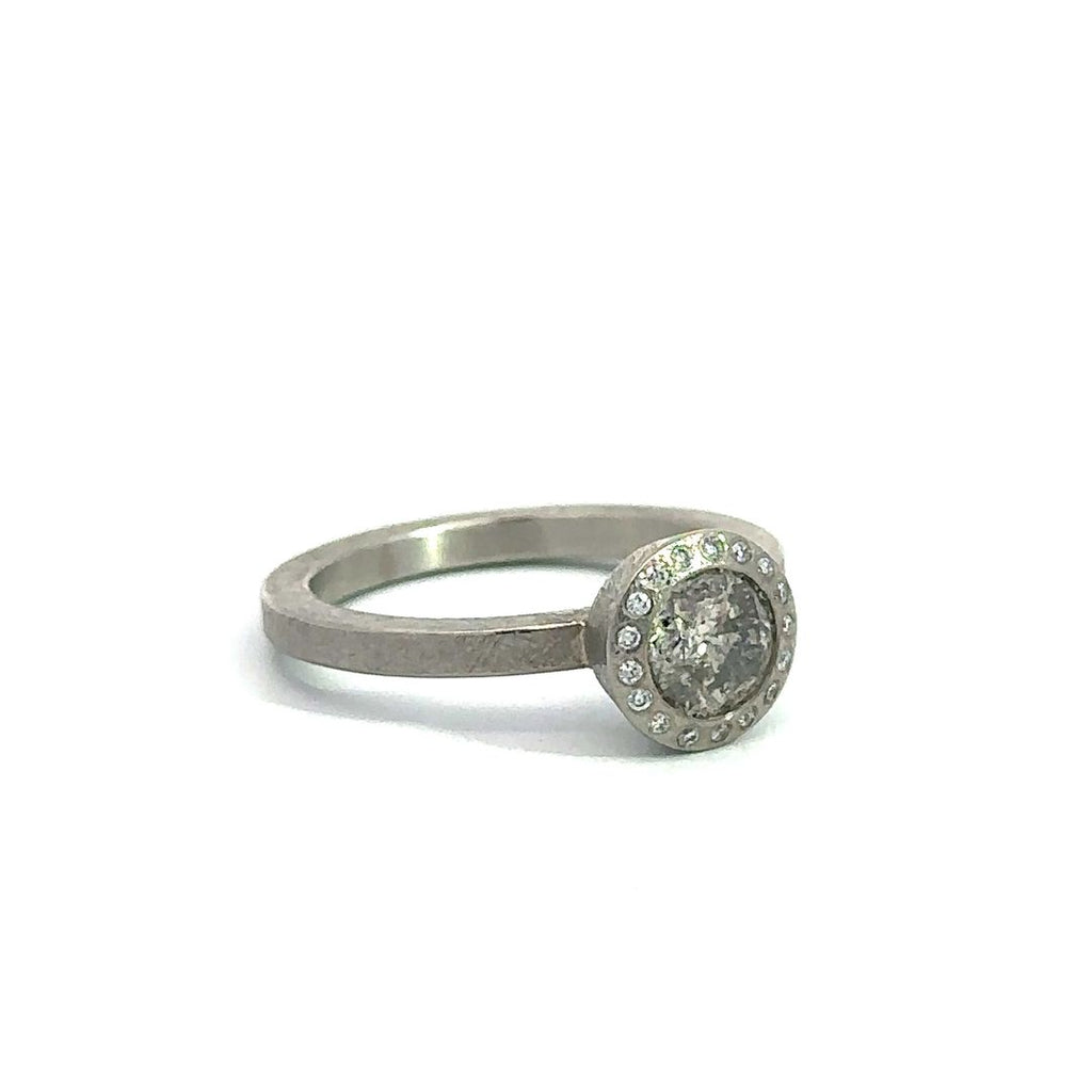 Todd Reed palladium round light brown diamond halo ring, side angle of ring 