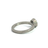 back side of Todd Reen palladium round light brown diamond halo ring showing the "Todd Reed" stamp inside the band