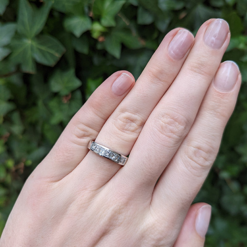 Princess Cut Diamond and 18K White Gold Channel Set Band ring on hand