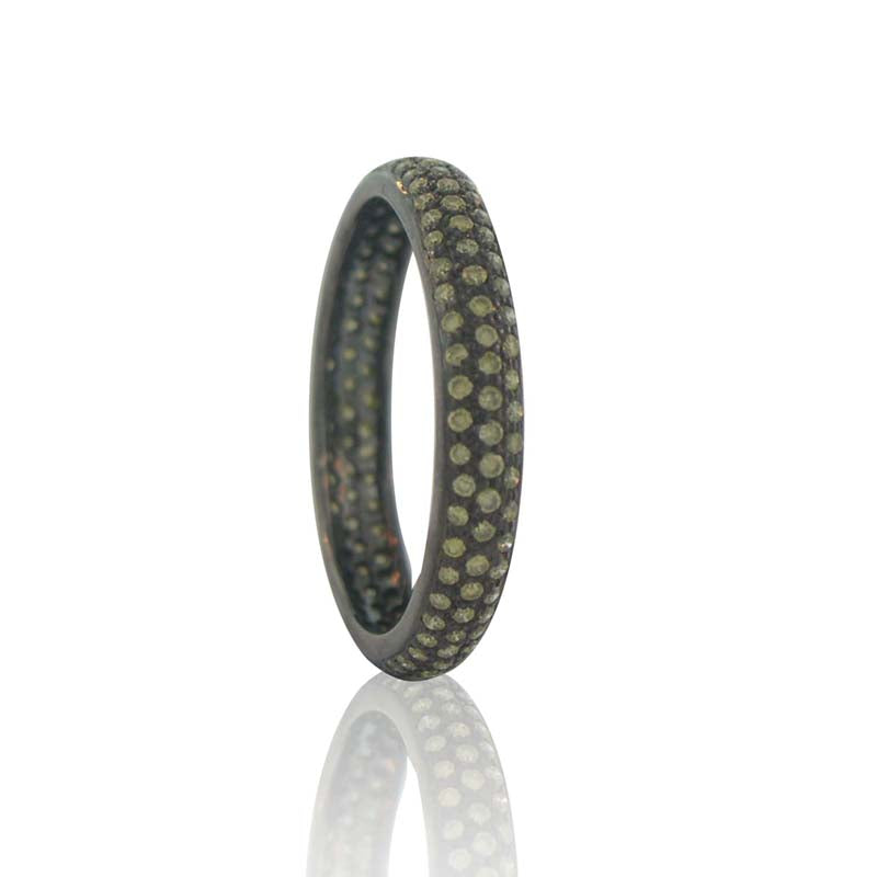 Black Sethi Couture ring with 3 rows of green diamonds, pave cut