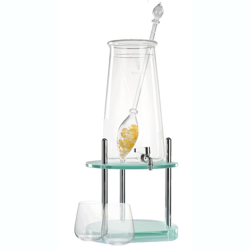 Sunny Morning clear Gem water dispenser with vial, orange calcite gem wand, stainless steel stand and dispenser, and two glasses