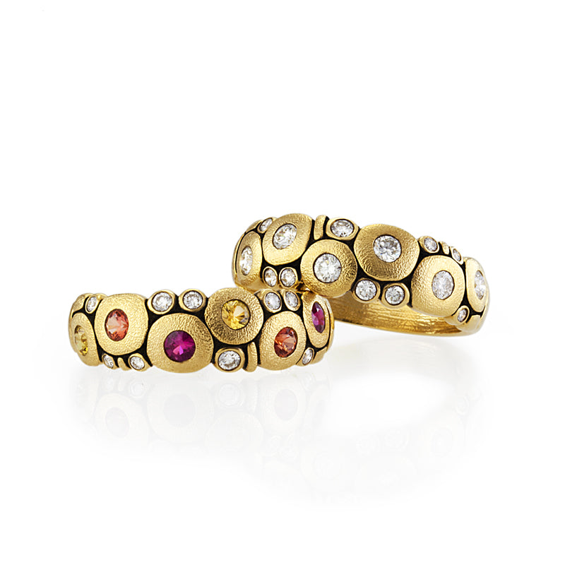 Two 18K yellow gold "Candy" rings. One with fire mix sapphires and one with all diamonds.