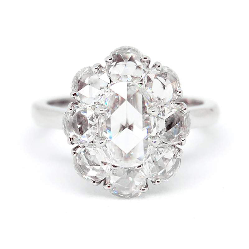 Bayco Jewels platinum ring centering a 0.91 carat D/SI1 GIA certified oval rose-cut diamond surrounded by round rose-cut diamonds