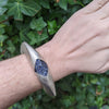 Coomi Sterling Silver and Iolite Bangle Bracelet on wrist