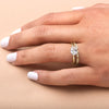 ILA East-West Oval Diamond Engagement Ring 18K Yellow Gold on hand