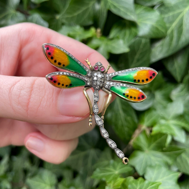 18K yellow gold, diamond, ruby, and red-yellow-green enamel dragonfly brooch, green leaf background