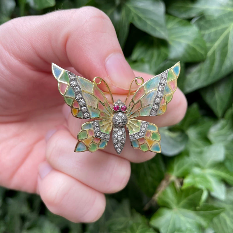 18K yellow gold pastel enamel, diamond and ruby butterfly brooch, green leaf background