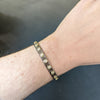 John Apel Two-Tone Diamond Cuff Bracelet on wrist