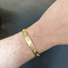 John Apel 18K Yellow Gold and Diamond Cuff Bracelet on wrist