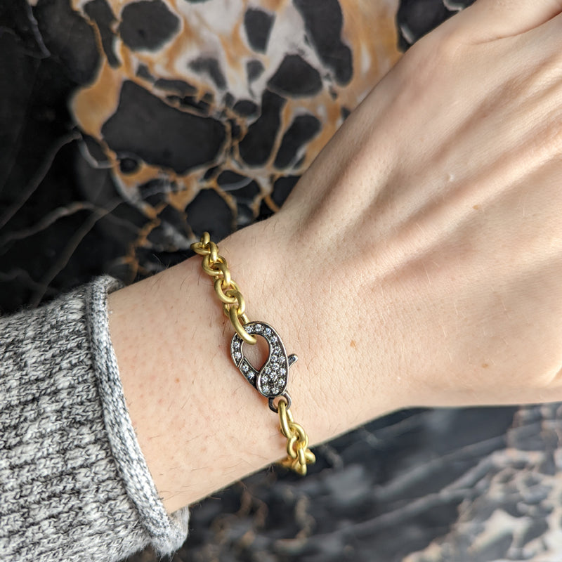 John Apel 18K Gold and Sterling Silver Diamond Clasp Bracelet on wrist