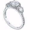 Mark Patterson Diamond and Platinum Three Stone Halo Mounted engagement ring