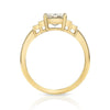 Caroline ring featuring a 1.54ct I/VVS2 GIA certified emerald cut diamond with 0.40ctw baguette cut accent diamonds set in an 18K yellow gold mounting, side view.