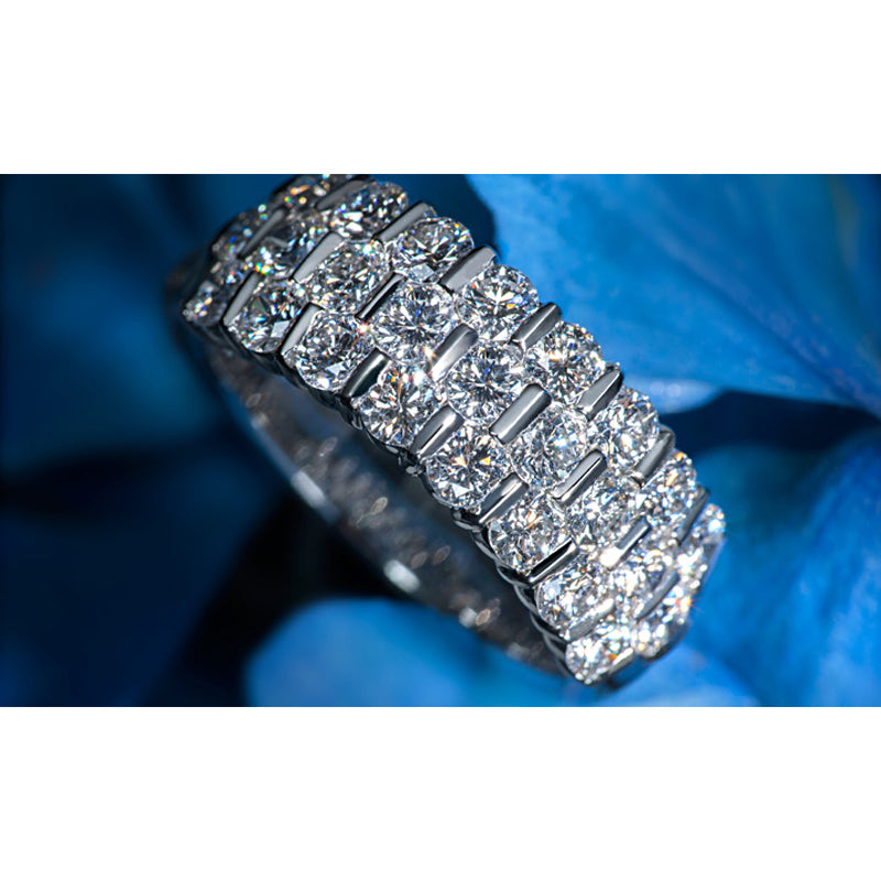 Suwa platinum three row diamond band, blue background