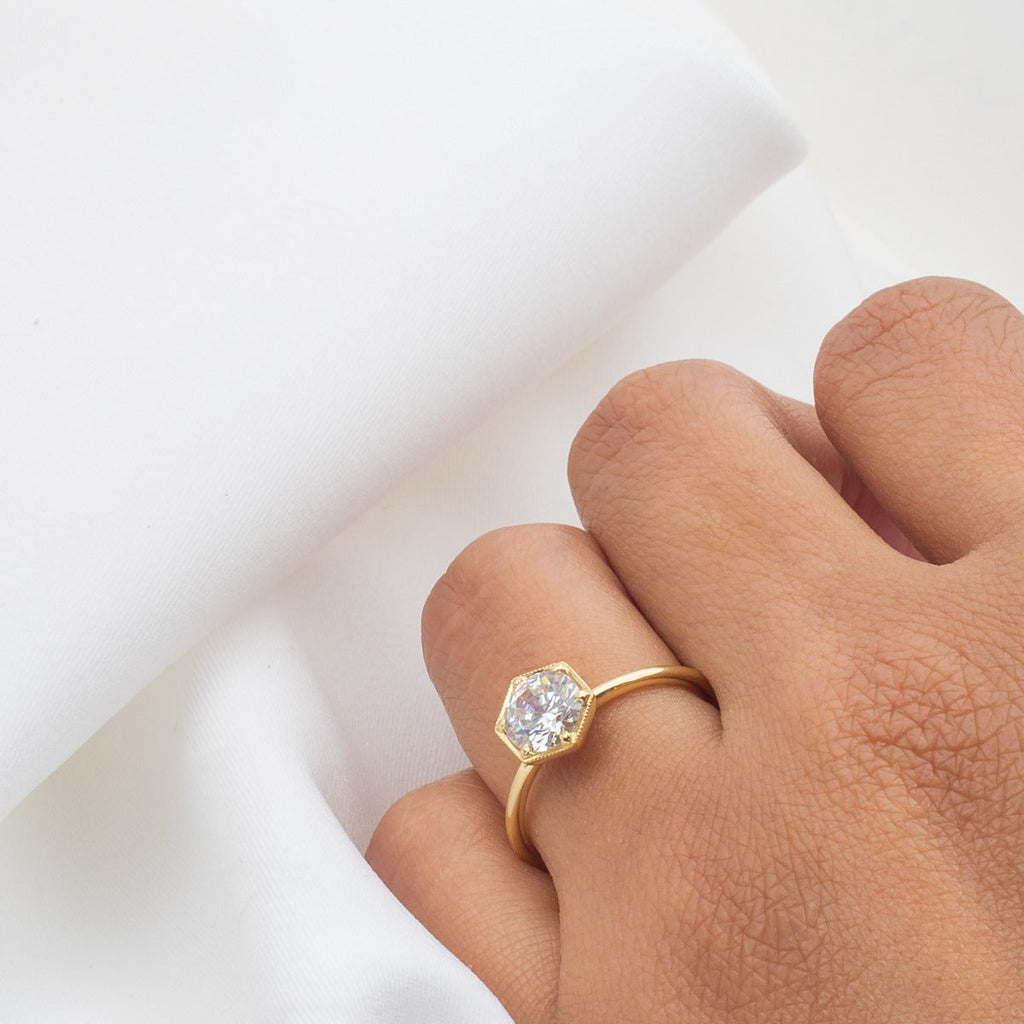 ILA Selene Round Diamond Engagement Ring 18K Yellow Gold on hand