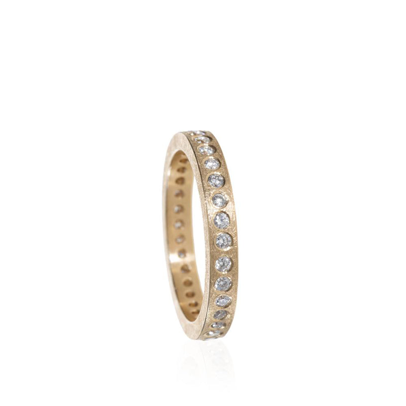 Todd Reed rose gold ring with rough texture and diamonds set into grooves