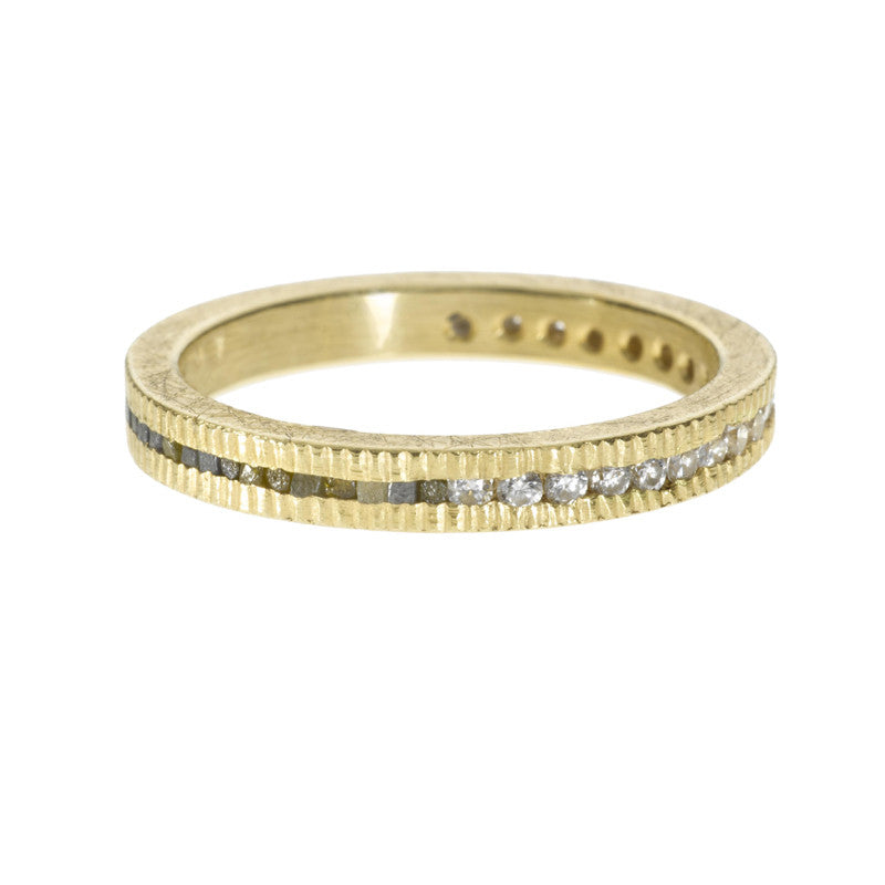 gold coin-themed ring by Todd Reed with texture of quarter, set with raw cube diamonds and white diamonds