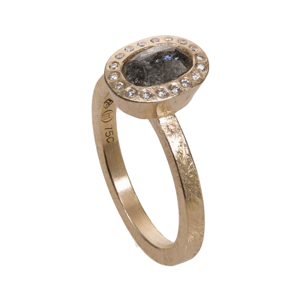 18K rose gold ring with fancy cut oval shape grey diamond center and white flush set diamond halo