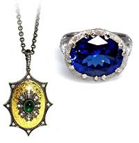Arman gold and silver oval pendant with diamonds and green tsavorite and Alex Sepkus platinum ring with oval blue sapphire.